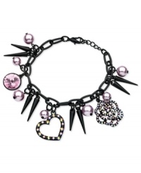 Cutting-edge chic. This charm bracelet from GUESS is crafted from sprayed-jet mixed metal with glass pearls and crystal stones scattered amid a spiky landscape. Approximate length: 7-1/2 inches + 1-inch extender. Approximate drop: 1-1/2 inches. Cutting-edge chic. This charm bracelet from GUESS is crafted from sprayed-jet mixed metal with glass pearls and crystal stones scattered amid a spiky landscape. Approximate length: 7-1/2 inches + 1-inch extender. Approximate drop: 1-1/2 inches.