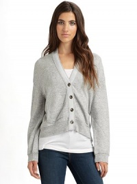 THE LOOKV necklineButton frontLong sleeves with ribbed cuffsGrosgrain ribbon trims the neckline & placketDual patch pocketsRibbed hemTHE FITAbout 25 from shoulder to hemTHE MATERIALCashmereCARE & ORIGINDry cleanImported THE LOOKV necklineButton frontLong sleeves with ribbed cuffsGrosgrain ribbon trims the neckline & placketDual patch pocketsRibbed hemTHE FITAbout 25 from shoulder to hemTHE MATERIALCashmereCARE & ORIGINDry cleanImported