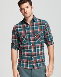 Whether you're grabbing a cheeseburger at the diner or catching the latest horror flick downtown, this cool plaid button-down spruces up your attire. Whether you're grabbing a cheeseburger at the diner or catching the latest horror flick downtown, this cool plaid button-down spruces up your attire.