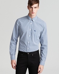 Traditional gingham defines this timeless Burberry Fred shirt and effortlessly represents the brand's classic-meets-cool aesthetic. Traditional gingham defines this timeless Burberry Fred shirt and effortlessly represents the brand's classic-meets-cool aesthetic.