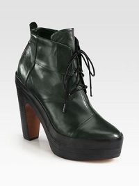 A chunky stacked heel elevates this lace-up silhouette of paneled leather. Stacked wooden heel, 5½ (140mm)Stacked wooden platform, 1¾ (45mm)Compares to a 3¾ heel (95mm)Leather upperLeather lining and solePadded insoleImported A chunky stacked heel elevates this lace-up silhouette of paneled leather. Stacked wooden heel, 5½ (140mm)Stacked wooden platform, 1¾ (45mm)Compares to a 3¾ heel (95mm)Leather upperLeather lining and solePadded insoleImported