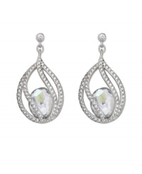 Polish your look with subtle refinement. Crystal Moonlight is encapsulated by intricate strands of clear Swarovski crystal pavé. This exquisite pair of silver tone mixed metal pierced earrings adds glamour to every look. Approximate drop: 1-3/8 inches. Polish your look with subtle refinement. Crystal Moonlight is encapsulated by intricate strands of clear Swarovski crystal pavé. This exquisite pair of silver tone mixed metal pierced earrings adds glamour to every look. Approximate drop: 1-3/8 inches.