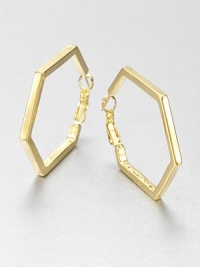 From the Play the Angles Collection. Simple geometrics are sophisticated and striking in a sleek hexagonal hoop with a gleaming golden finish.GoldtoneDiameter, about 1.5Pierced and hingedImported From the Play the Angles Collection. Simple geometrics are sophisticated and striking in a sleek hexagonal hoop with a gleaming golden finish.GoldtoneDiameter, about 1.5Pierced and hingedImported