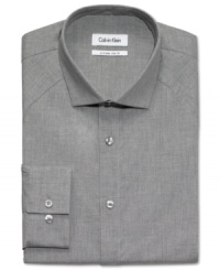 This Calvin Klein dress shirt offers a flattering fit and a classic style. This Calvin Klein dress shirt offers a flattering fit and a classic style.