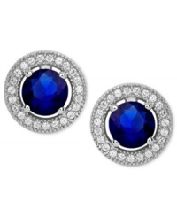 Make yourself the center of attention in CRISLU's drop earrings. Hand-cut, faceted clear cubic zirconias surround a round-cut sapphire-colored cubic zirconia (2-1/7 ct. t.w.) Set in platinum over sterling silver. Approximate drop: 2/5 inch. Make yourself the center of attention in CRISLU's drop earrings. Hand-cut, faceted clear cubic zirconias surround a round-cut sapphire-colored cubic zirconia (2-1/7 ct. t.w.) Set in platinum over sterling silver. Approximate drop: 2/5 inch.