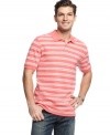 Sharp stripes lend a sporty touch to this classic polo shirt from Club Room.