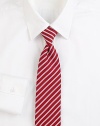 Some things are timeless, and this classic tie, woven in Italian silk with contrast stripes, is one of them. About 3 wideSilkDry cleanMade in Italy