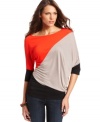 Bold colorblocking adds a modern edge to this BCBGMAXAZRIA top for cool, yet casual style!