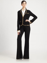 This iconic knit cricket jacket is trimmed with hand-applied metallic sequins.Notched lapelsPatch pocketsButton frontSequined trimAbout 23 from shoulder to hem58% silk/32% viscose/10% nylonDry cleanMade in ItalyModel shown is 5'9½ (176cm) wearing US size Small. This iconic knit cricket jacket is trimmed with hand-applied metallic sequins.Notched lapelsPatch pocketsButton frontSequined trimAbout 23 from shoulder to hem58% silk/32% viscose/10% nylonDry cleanMade in ItalyModel shown is 5'9½ (176cm) wearing US size Small.