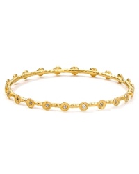 Embrace the season's eclectic approach to accessorizing with this hammered gold-plated bangle from Melinda Maria. Designed to add a touch of luxe to every look this piece is adorned with striking crystal stations. Embrace the season's eclectic approach to accessorizing with this hammered gold-plated bangle from Melinda Maria. Designed to add a touch of luxe to every look this piece is adorned with striking crystal stations.