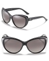 Retro-inspired cat eye sunglasses with a two tone layered look along frames.