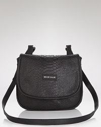 A little bit bohemian, a little bit luxurious. This See by Chloé crossbody flaunts free-spirited allure, with its vintage-inspired shape and textured leather. A little bit bohemian, a little bit luxurious. This See by Chloé crossbody flaunts free-spirited allure, with its vintage-inspired shape and textured leather.