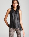 Exposed zips at the shoulders lend edge to this GUESS top, articulated in a sleeveless silhouette with button front and flap pockets.