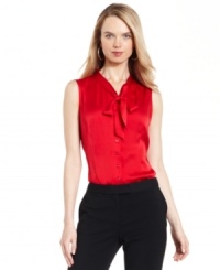 Perfect for bringing a feminine flourish to your work wardrobe, Tahari by ASL's tie-neck satin shell adds ladylike appeal to suits and separates. Perfect for bringing a feminine flourish to your work wardrobe, Tahari by ASL's tie-neck satin shell adds ladylike appeal to suits and separates.