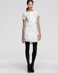 Jagged sequin stripes add edgy allover sparkle to this stellar new Sanctuary dress--a daring open back ensures a dramatic exit. Jagged sequin stripes add edgy allover sparkle to this stellar new Sanctuary dress--a daring open back ensures a dramatic exit.