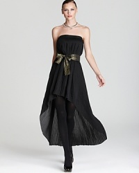 Be the life of the party in this KAS New York dress with an elegant high-low hem and flirty metallic belt. Be the life of the party in this KAS New York dress with an elegant high-low hem and flirty metallic belt.