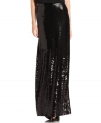 MICHAEL Michael Kors' petite maxi skirt is made for evening with a shimmering, fully sequined silhouette. MICHAEL Michael Kors' petite maxi skirt is made for evening with a shimmering, fully sequined silhouette.