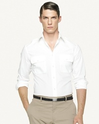 Finely tailored with a trim fit and modern proportions, a handsome shirt is crafted in Italy from sleek stretch poplin with military-inspired epaulets. Finely tailored with a trim fit and modern proportions, a handsome shirt is crafted in Italy from sleek stretch poplin with military-inspired epaulets.