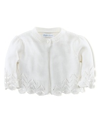 A comfortable knit shrug is crafted in a delicate pointelle cotton, making it perfect for both casual and festive occasions. A comfortable knit shrug is crafted in a delicate pointelle cotton, making it perfect for both casual and festive occasions.