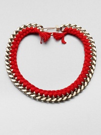 A chunky chain, with the look of a vintage ID bracelet, is modernized with bright red braiding with tassels and a fun paper-clip clasp.GoldplatedCottonLength, about 16.5Spring ring paper clip claspMade in France A chunky chain, with the look of a vintage ID bracelet, is modernized with bright red braiding with tassels and a fun paper-clip clasp.GoldplatedCottonLength, about 16.5Spring ring paper clip claspMade in France