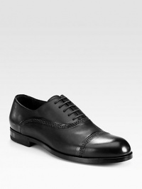 Handsome leather oxford with impeccable hand stitching and painting, exuding expert Italian craftsmanship and attention to detail.Leather upperLeather liningPadded insoleRubber soleMade in Italy Handsome leather oxford with impeccable hand stitching and painting, exuding expert Italian craftsmanship and attention to detail.Leather upperLeather liningPadded insoleRubber soleMade in Italy
