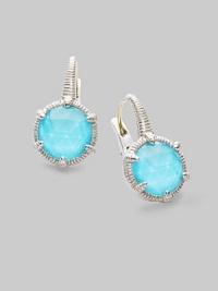 From the Eclipse Collection. A vividly colored, richly faceted turquoise sits in a sterling silver pronged setting with a graceful fluted texture. Turquoise Sterling silver Drop, about ¾ Diameter, about ½ Ear wire Imported