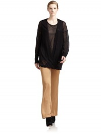 THE LOOKSemi-sheer knitDeep cross-front styleLong sleevesRib-knit cuffs, neckline and hemAttached chiffon tank top with rib-knit crewneckTHE FITAbout 27 from shoulder to hemTHE MATERIAL50% silk/50% alpacaTop: 96% silk/4% elastaneCARE & ORIGINDry cleanMade in ItalyModel shown is 5'10 (177cm) wearing US size Small. THE LOOKSemi-sheer knitDeep cross-front styleLong sleevesRib-knit cuffs, neckline and hemAttached chiffon tank top with rib-knit crewneckTHE FITAbout 27 from shoulder to hemTHE MATERIAL50% silk/50% alpacaTop: 96% silk/4% elastaneCARE & ORIGINDry cleanMade in ItalyModel shown is 5'10 (177cm) wearing US size Small.