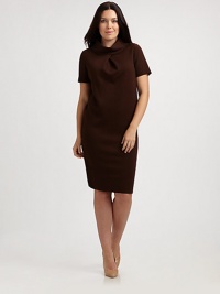 A modern nod to mod, this short-sleeve wool shift offers you a relaxed-yet-flattering fit.Fold-over collarShort sleevesPull-on styleAbout 24 from natural waistWoolDry cleanMade in Italy A modern nod to mod, this short-sleeve wool shift offers you a relaxed-yet-flattering fit.Fold-over collarShort sleevesPull-on styleAbout 24 from natural waistWoolDry cleanMade in Italy