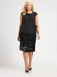Leave it to supple silk to add a luxurious feel to this ultra-feminine top with a pleated neckline. Its self belt helps to give you this season's requisite hourglass shape. Pleated round necklineCap sleevesSelf-tie beltConcealed back zipperAbout 27 from shoulder to hemSilkDry cleanImported Leave it to supple silk to add a luxurious feel to this ultra-feminine top with a pleated neckline. Its self belt helps to give you this season's requisite hourglass shape. Pleated round necklineCap sleevesSelf-tie beltConcealed back zipperAbout 27 from shoulder to hemSilkDry cleanImported