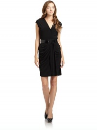 THE LOOKCrossover v-neck Cap sleeves Gathered waistWide belt with buckle closure Draped skirt with pleated details THE FITAbout 32 from shoulder to hemTHE MATERIALPolyesterFully linedCARE & ORIGINDry cleanMade in USAModel shown is 5'9½ (176cm) wearing US size 4. THE LOOKCrossover v-neck Cap sleeves Gathered waistWide belt with buckle closure Draped skirt with pleated details THE FITAbout 32 from shoulder to hemTHE MATERIALPolyesterFully linedCARE & ORIGINDry cleanMade in USAModel shown is 5'9½ (176cm) wearing US size 4.