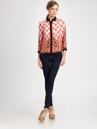 A duo of ladylike prints and bold trim flawlessly complement this luxe silk blouse.Collar neckThree-quarter sleevesButton-down styleBack yokeAllover printSolid trimAbout 21 from shoulder to hemSilkDry cleanMade in USA of imported fabricSIZE & FIT Model shown is 5'11 (180cm) wearing a US size 4. 