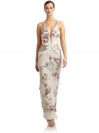 THE LOOKAllover floral print with beaded appliquéPlunging V-neckTwisted strapsPleated bustSide cutouts at waist with sheer mesh insetsSide zip with hook-and-eye closureY-back strapsTHE FITAbout 58 from shoulder to hemTHE MATERIALSilkSilk liningCARE & ORIGINDry cleanMade in ItalyModel shown is 5'10½ (179cm) wearing US size 4. THE LOOKAllover floral print with beaded appliquéPlunging V-neckTwisted strapsPleated bustSide cutouts at waist with sheer mesh insetsSide zip with hook-and-eye closureY-back strapsTHE FITAbout 58 from shoulder to hemTHE MATERIALSilkSilk liningCARE & ORIGINDry cleanMade in ItalyModel shown is 5'10½ (179cm) wearing US size 4.