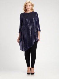 This silk top with allover sequins will move with you as its draped, asymmetrical hem provides a flattering and feminine silhouette.BoatneckThree-quarter sleevesAsymmetrical hemAllover sequinsConcealed back zipperFully linedAbout 35 from shoulder to hemSilkDry cleanImported