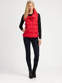 A puffy nylon vest with a decidedly feminine silhouette and convenient slash pockets.Stand collarSleevelessConcealed front closureSlash pocketsAbout 26 from shoulder to hemBody: nylonFill: down feathers/other feathersDry cleanImportedSIZE & FIT Model shown is 5'10½ (179cm) wearing a US size Small. A puffy nylon vest with a decidedly feminine silhouette and convenient slash pockets.Stand collarSleevelessConcealed front closureSlash pocketsAbout 26 from shoulder to hemBody: nylonFill: down feathers/other feathersDry cleanImportedSIZE & FIT Model shown is 5'10½ (179cm) wearing a US size Small.