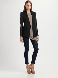 Minimalist tailoring in fine Italian wool, finished with supple leather sleeves.Leather stand collar Hidden one-button front closure Shaping seams Front welt pockets Center back vent Leather sleeves Wool Dry clean by leather professional ImportedOUR FIT MODEL RECOMMENDS ordering true size. Minimalist tailoring in fine Italian wool, finished with supple leather sleeves.Leather stand collar Hidden one-button front closure Shaping seams Front welt pockets Center back vent Leather sleeves Wool Dry clean by leather professional ImportedOUR FIT MODEL RECOMMENDS ordering true size.