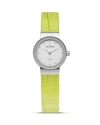 Add a sleek shot of color to your look with this watch from Skagen. Accented by a bold yellow leather band, it boasts an understated silhouette and advanced Japanese quartz movement for the perfect fusion of form and function. Add a sleek shot of color to your look with this watch from Skagen. Accented by a bold yellow leather band, it boasts an understated silhouette and advanced Japanese quartz movement for the perfect fusion of form and function.