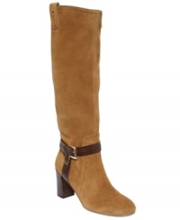 The contrasting leather harness on the ankle of Tommy Hilfiger's Gemmale tall boots gives this suave style an added trendy touch. The contrasting leather harness on the ankle of Tommy Hilfiger's Gemmale tall boots gives this suave style an added trendy touch.