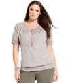 Look casually chic this season with INC's plus size peasant top, finished by charming applique.