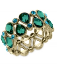 Make a colorful splash with this stretch bracelet from 2028. Crafted from gold-tone mixed metal, the bracelet features green glass and blue zircon beads for a stunning effect. Approximate diameter: 2-1/2 inches. Make a colorful splash with this stretch bracelet from 2028. Crafted from gold-tone mixed metal, the bracelet features green glass and blue zircon beads for a stunning effect. Approximate diameter: 2-1/2 inches.