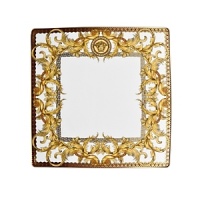 The most legendary figure of Asian mythology, the red dragon rises majestically from this fabulously opulent dinnerware from Rosenthal Meets Versace, conveying all its might and glory. Each piece features ornate golden baroque patterns and four small medallions representing the sun, and the Versace medusa decorates the background. The most legendary figure of Asian mythology, the red dragon rises majestically from this fabulously opulent dinnerware from Rosenthal Meets Versace, conveying all its might and glory. Each piece features ornate golden baroque patterns and four small medallions representing the sun, and the Versace medusa decorates the background.