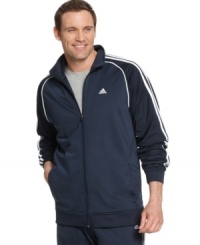Kick back with the ultimate in athletic-infused style and zip up in this supersoft fleece-lined track jacket from adidas. Kick back with the ultimate in athletic-infused style and zip up in this supersoft fleece-lined track jacket from adidas.