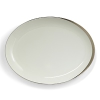 A hand-painted crescent of stunning platinum rims the edges of this thoroughly modern dinnerware collection. A hand-painted crescent of stunning platinum rims the edges of this thoroughly modern dinnerware collection.