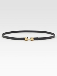 A charming, goldtone, kissing fox hook-and-eye closure adds a little shine to this skinny leather belt.Width, about .5Imported