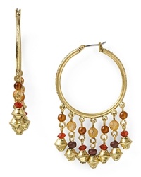 Update your wardrobe with a tribal touch. This pair of Lauren by Ralph Lauren earrings does that with its cool cascade of multi hued beads and worn gold plate. Update your wardrobe with a tribal touch. This pair of Lauren by Ralph Lauren earrings does that with its cool cascade of multi hued beads and worn gold plate.