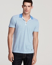 A special blend of cotton and linen for textured softness and a smooth drape, tailored for a modern slim fit, this BOSS Orange polo strikes a balance between relaxed and refined. A special blend of cotton and linen for textured softness and a smooth drape, tailored for a modern slim fit, this BOSS Orange polo strikes a balance between relaxed and refined.
