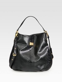 A simply chic design in luxurious snake embossed leather with a versatile detachable strap.Top handle, 5 dropDetachable adjustable shoulder strap, 17½-21½ dropMagnetic top closureOne inside zip pocketTwo inside open pocketsFully lined14W X 13H X 5DImported A simply chic design in luxurious snake embossed leather with a versatile detachable strap.Top handle, 5 dropDetachable adjustable shoulder strap, 17½-21½ dropMagnetic top closureOne inside zip pocketTwo inside open pocketsFully lined14W X 13H X 5DImported