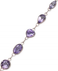 Add a royal touch to your look. Rich amethyst (6 ct. t.w.) in oval and round shapes shine bright against a 14k gold setting. Approximate length: 7 inches. Add a royal touch to your look. Rich amethyst (6 ct. t.w.) in oval and round shapes shine bright against a 14k gold setting. Approximate length: 7 inches.