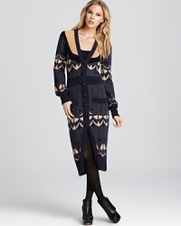 Bring sumptuous style to your winter wardrobe with this long Sonia Rykiel cardigan woven in a classic Fair Isle pattern. Bring sumptuous style to your winter wardrobe with this long Sonia Rykiel cardigan woven in a classic Fair Isle pattern.