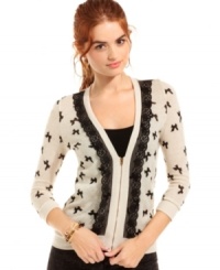 Zip-up in Fresh Brewed's cool new take on the every day cardi! Features a bow-print, lace trims and an awesome zip-front design. Zip-up in Fresh Brewed's cool new take on the every day cardi! Features a bow-print, lace trims and an awesome zip-front design.