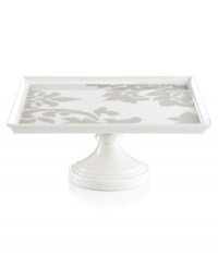 Stenciled grey florals in white porcelain make this square cake stand a must with Lisbon Grey and Banded dinnerware, also by Martha Stewart Collection. Stenciled grey florals in white porcelain make this square cake stand a must with Lisbon Grey and Banded dinnerware, also by Martha Stewart Collection.